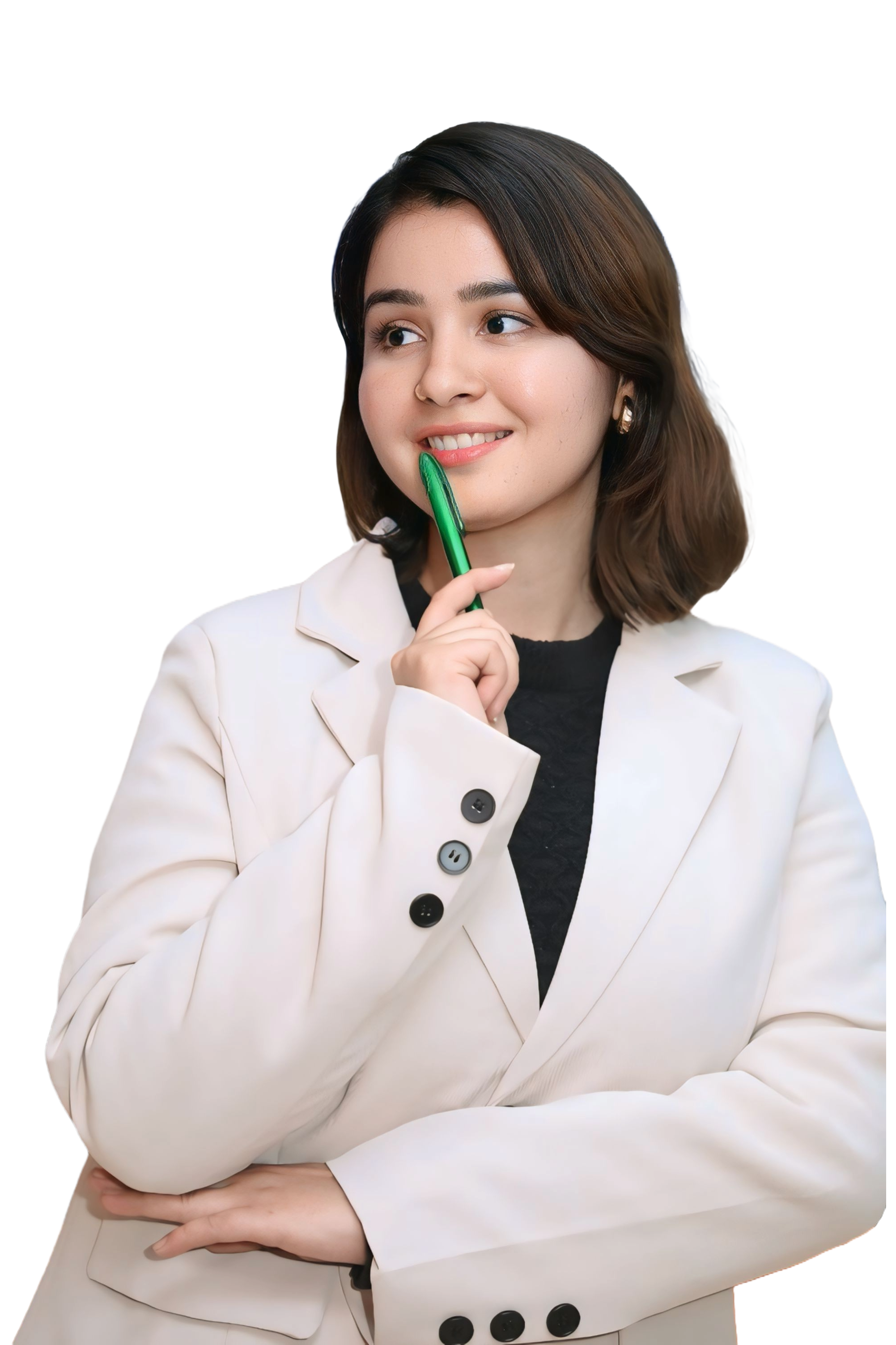 A smiling woman sitting cross-legged with books beside her